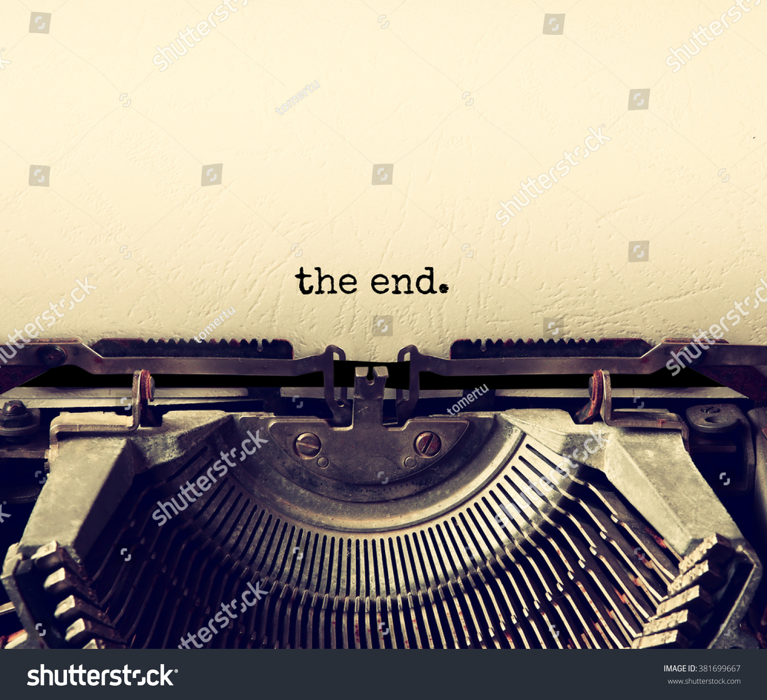 close up image of typewriter with paper sheet and the phrase: THE END . copy space for your text. retro filtered
 #381699667