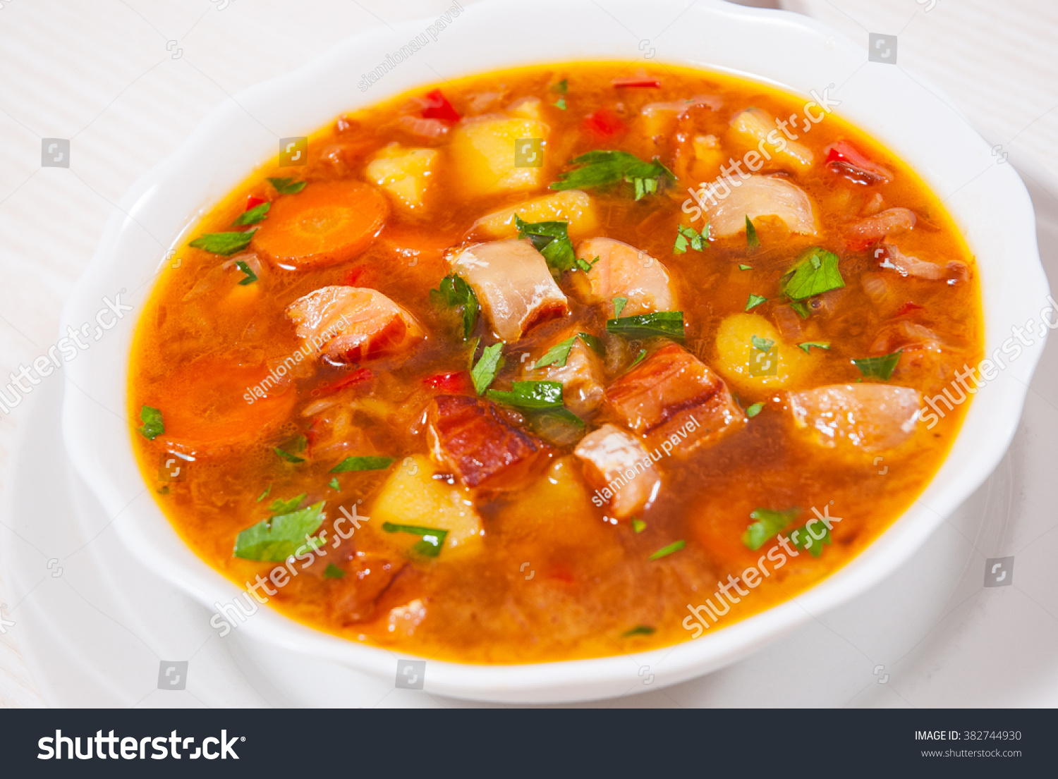 Fish soup with vegetables #382744930