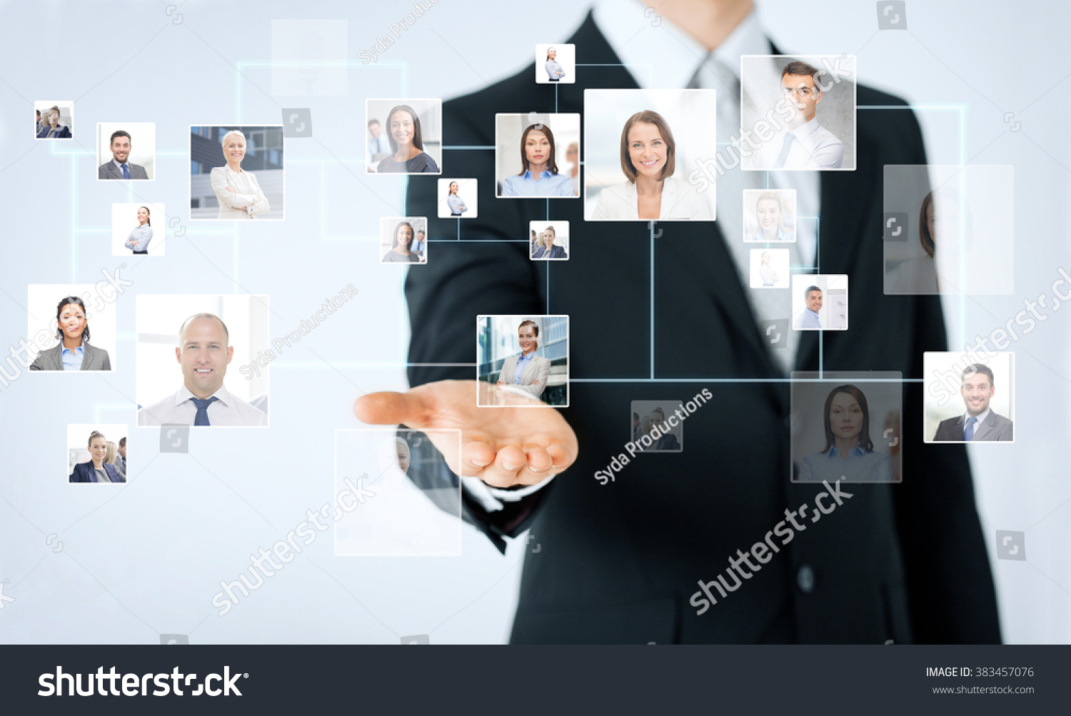 people, business, technology, headhunting and cooperation concept - close up of man hand showing business contacts icons projection #383457076