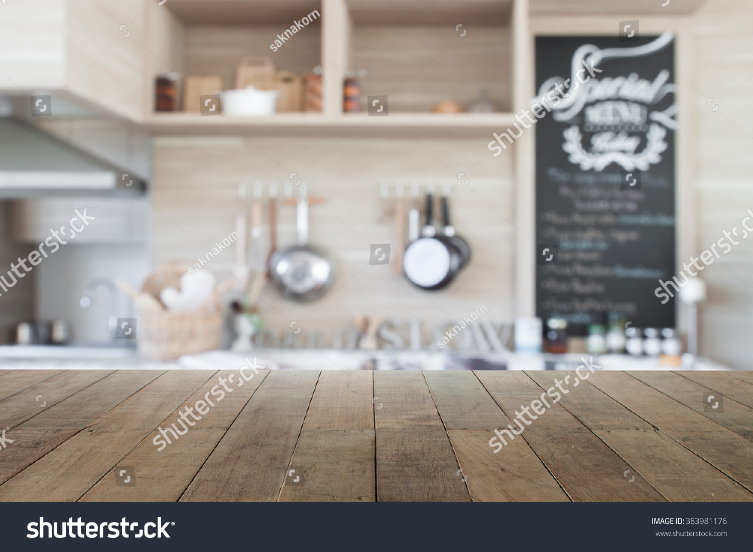 Wood table top with blur kitchen background , empty wooden table for product display #383981176