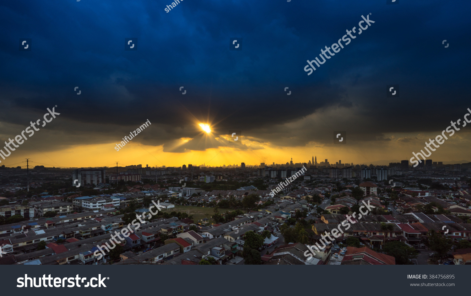 Stormy and rainy sunset in downtown Kuala Lumpur  #384756895