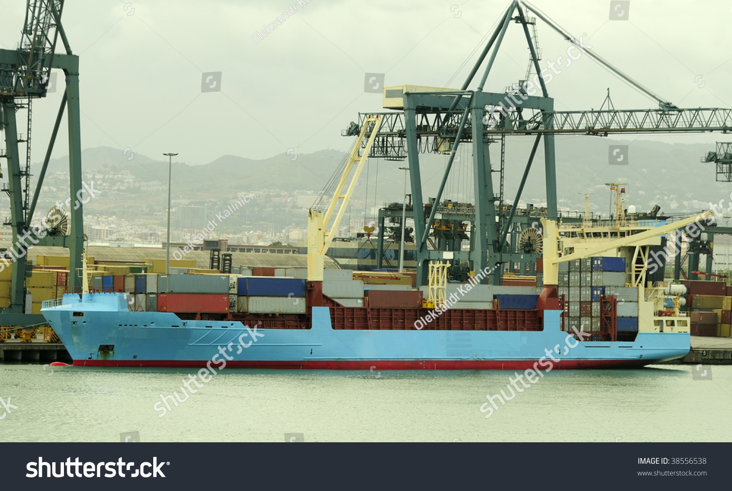 Shipping port with cranes and container ship #38556538