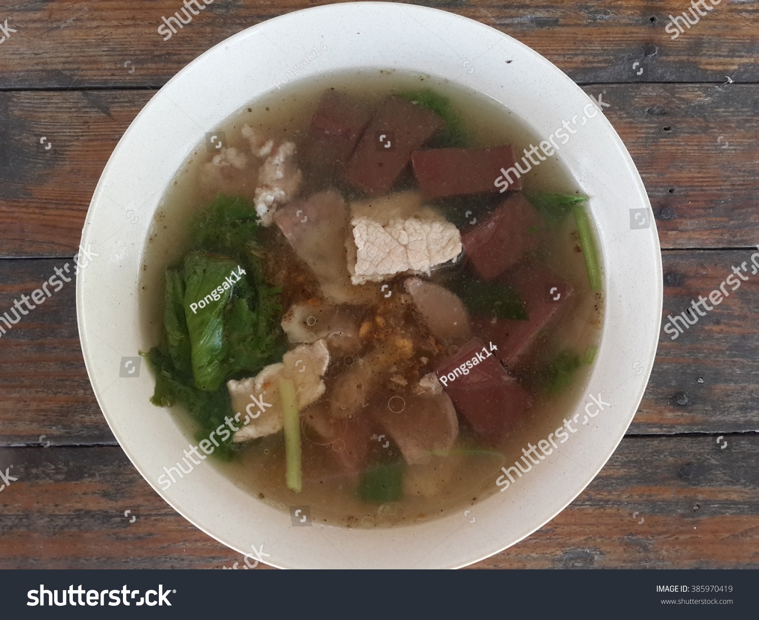 boiled pig's blood with entrails in soup - Thailand healthy food #385970419