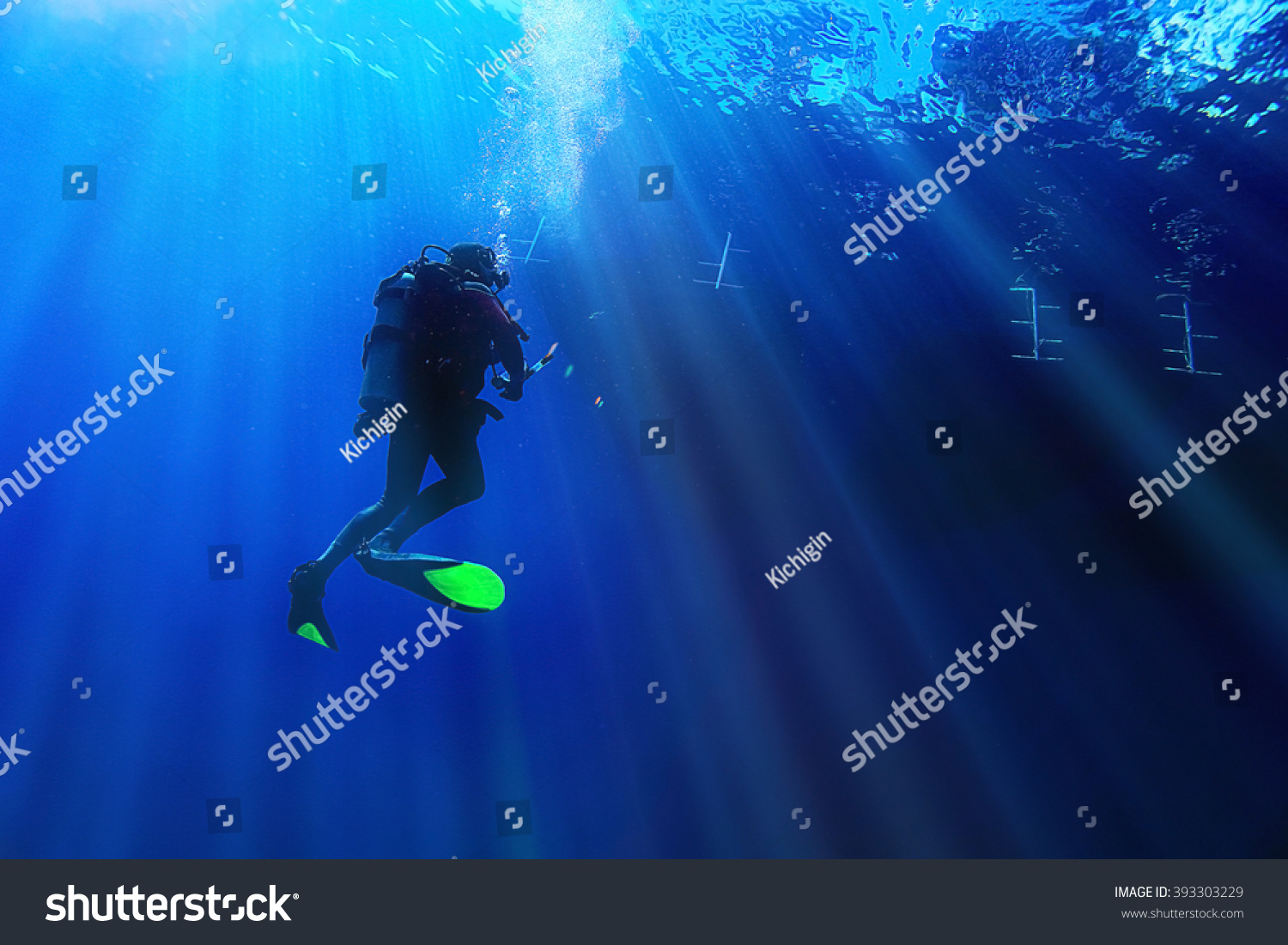 unusual photo diver underwater background #393303229