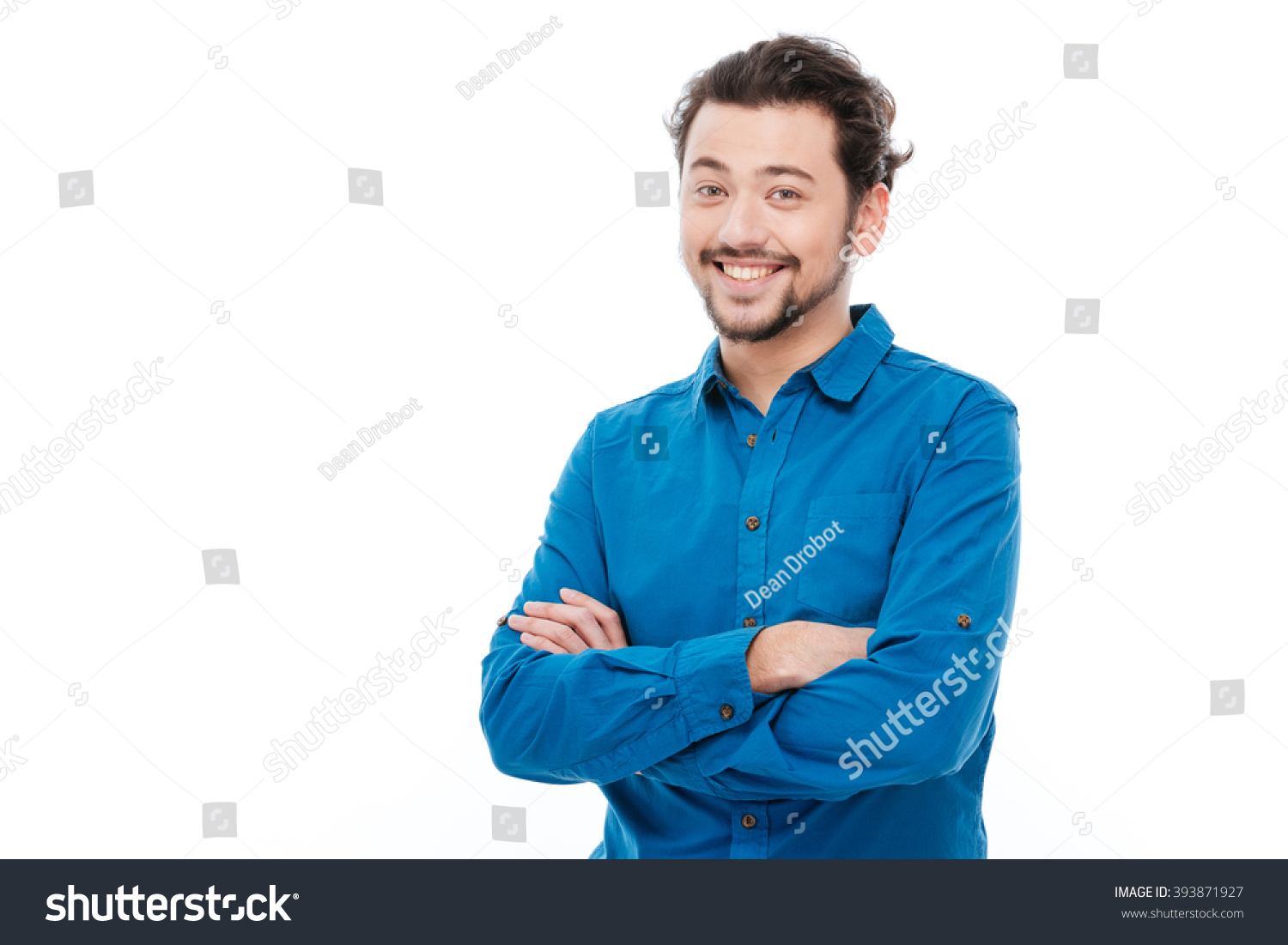 Portrait of a happy man with arms folded standing isolated on a white background #393871927