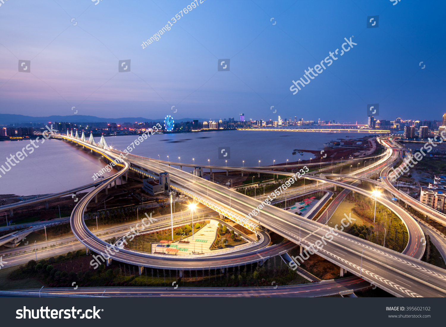 Asia's largest across the rivers in Shanghai landmarks a spiral bridge at night #395602102