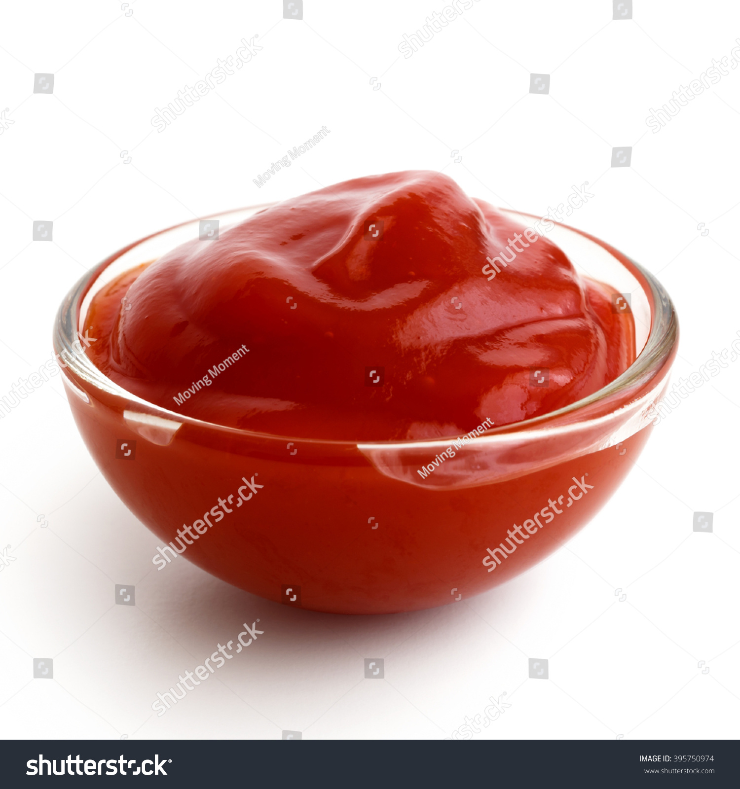 Small glass condiment bowl of red tomato sauce ketchup. Isolated on white in perspective. #395750974