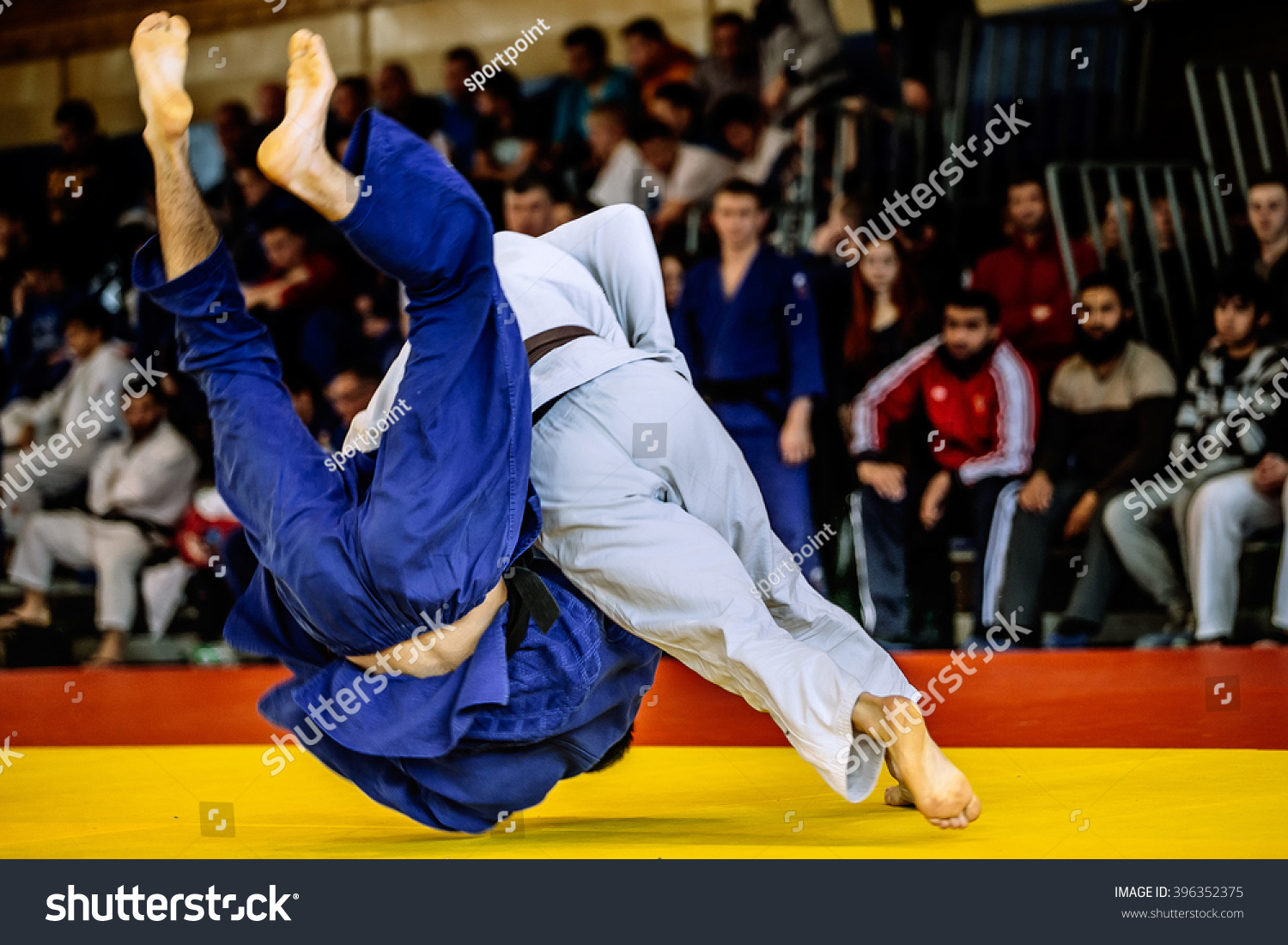 fighter judo throw for IPPON in competition judo #396352375