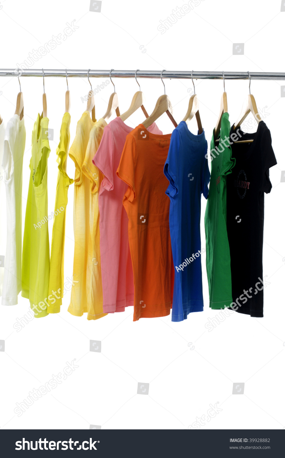 bright colored Tee Shirts hanging #39928882