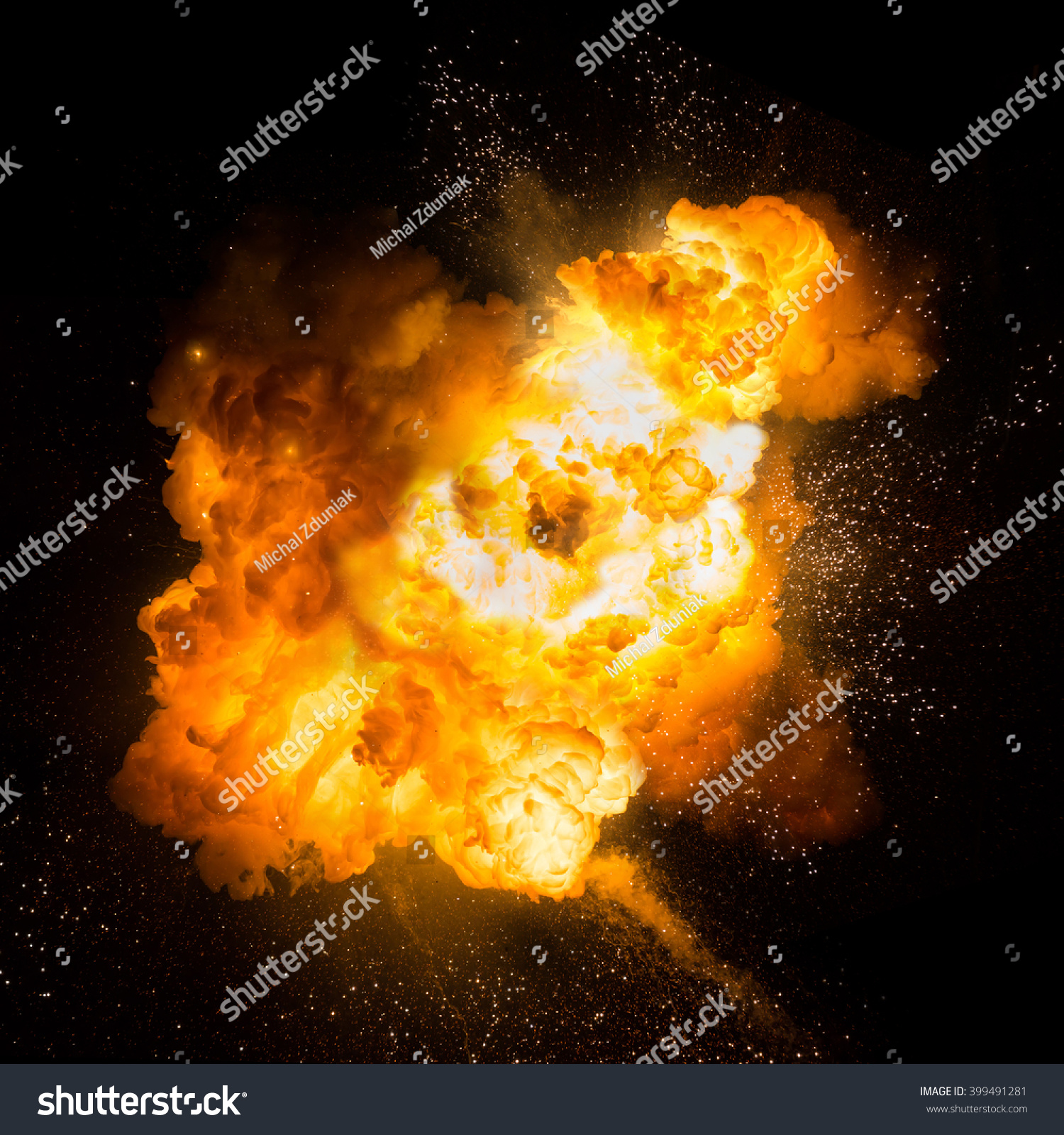 Realistic fiery explosion over a black background #399491281