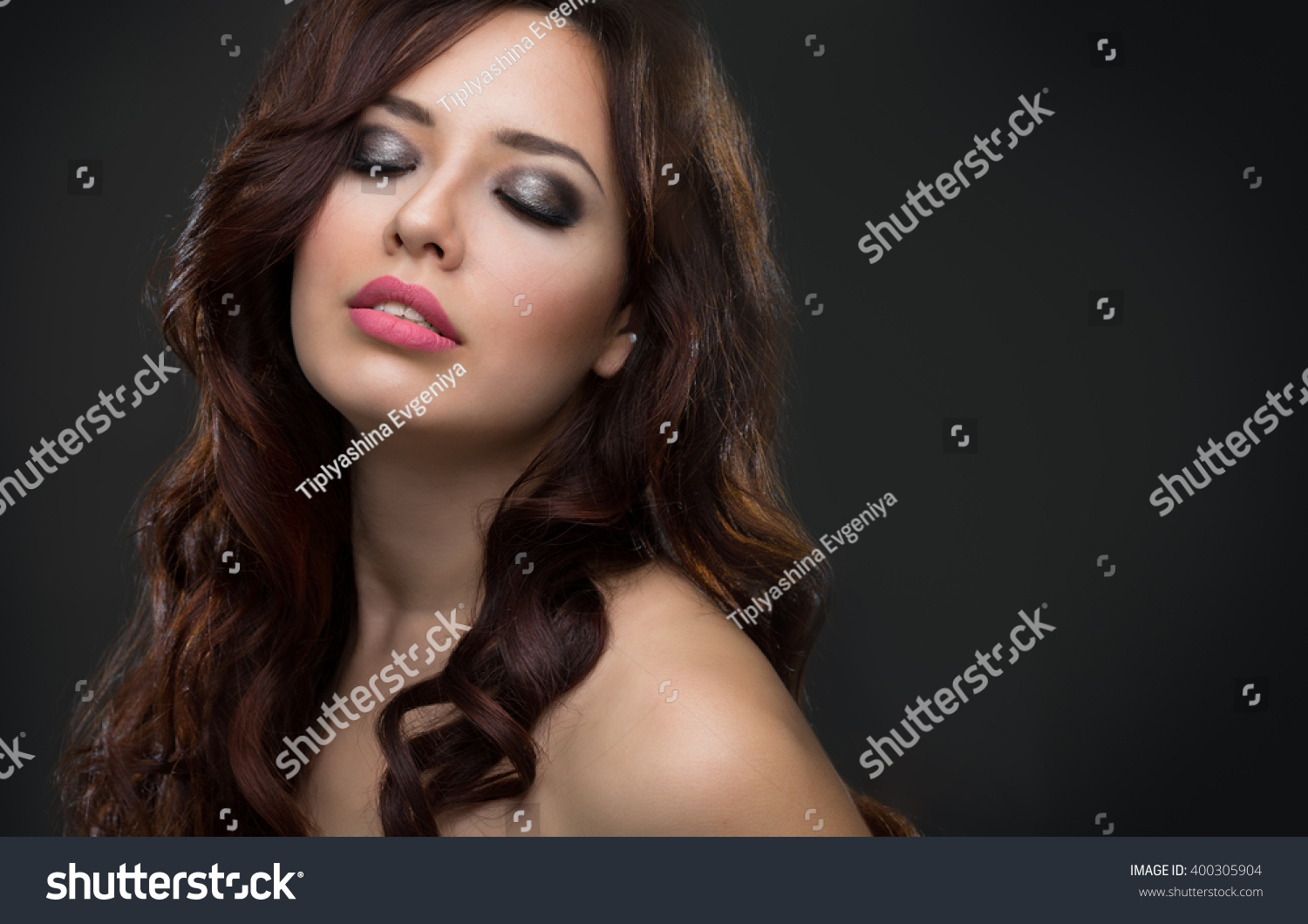 Young beautiful woman with long hair #400305904