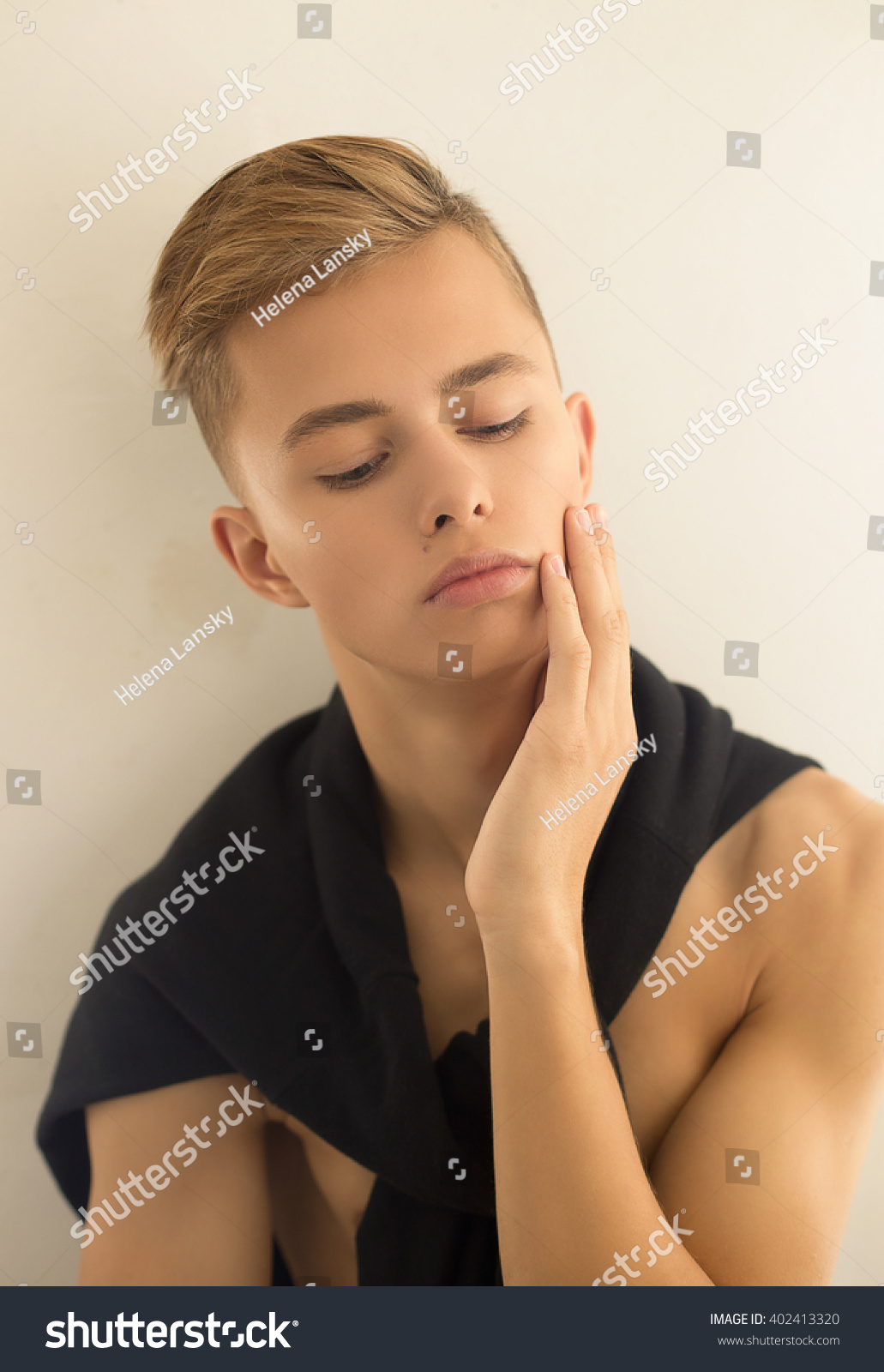 Young Man With Blonde Hair Wearing Stock Photo 402413320