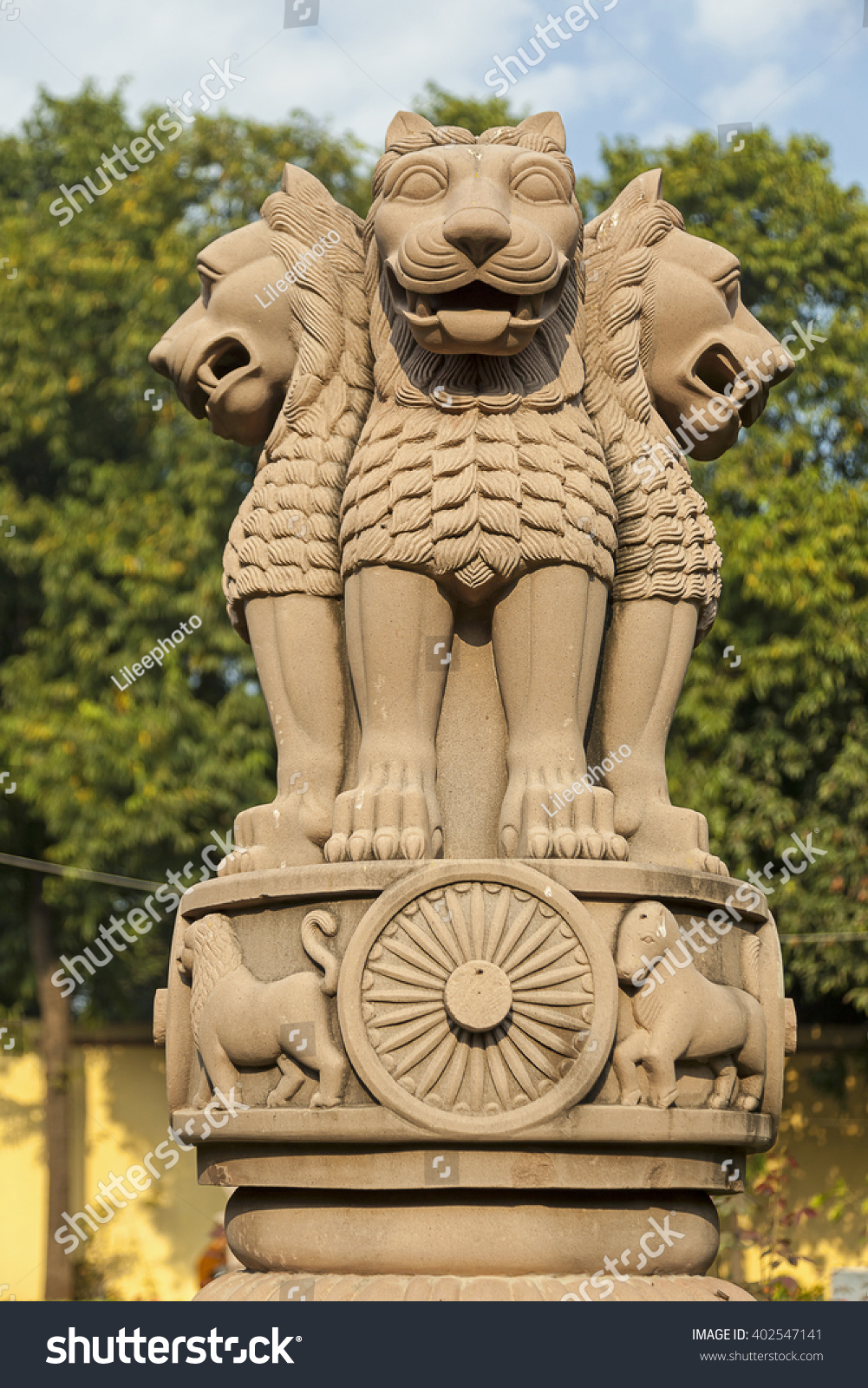 sculpture of emblem of India, four lion symbolizing power, courage, pride and confidence - rest on a circular abacus, India #402547141