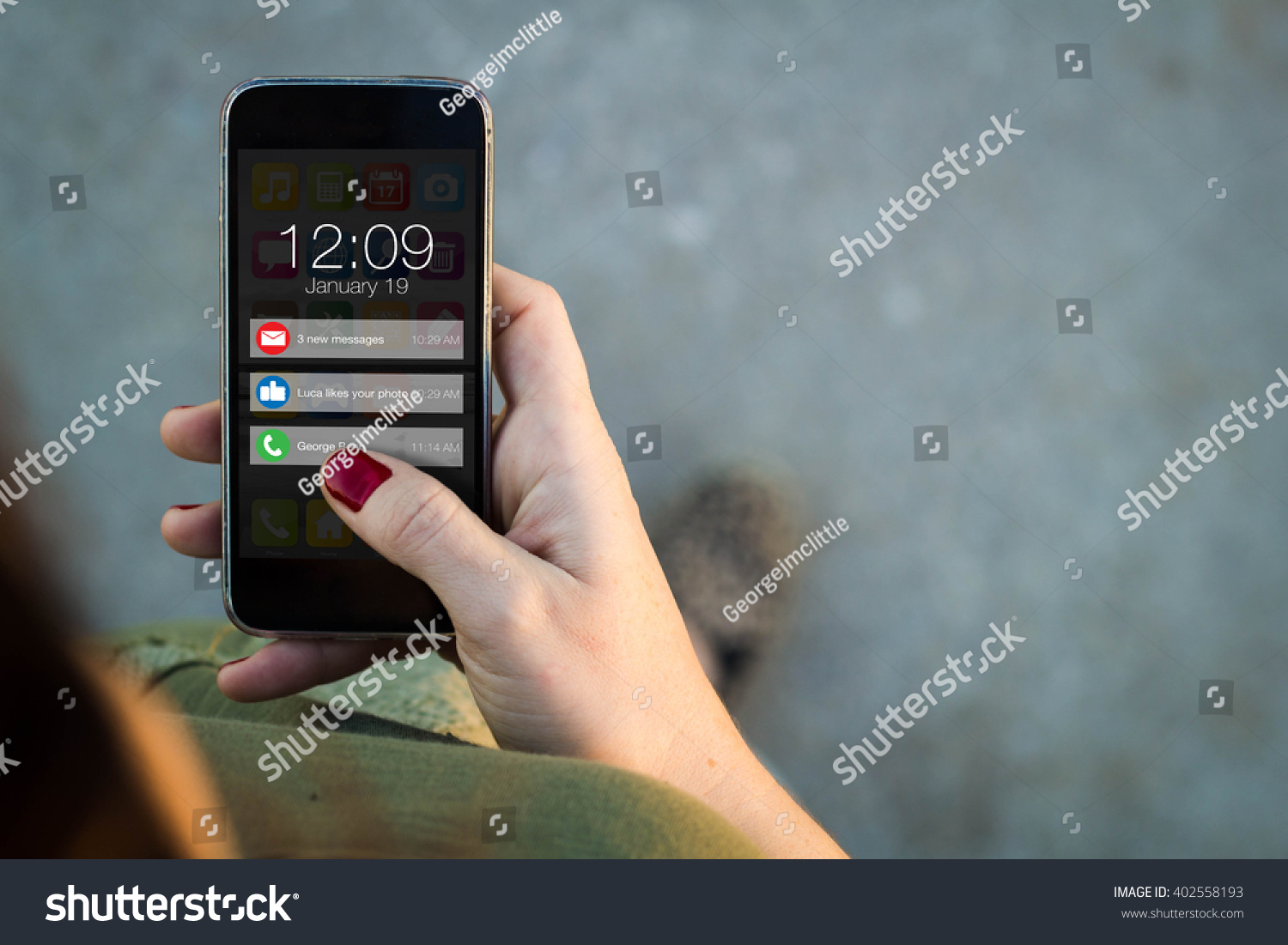 connectivity concept: Top view of woman walking in the street using her mobile phone with notifications on screen. All screen graphics are made up. #402558193