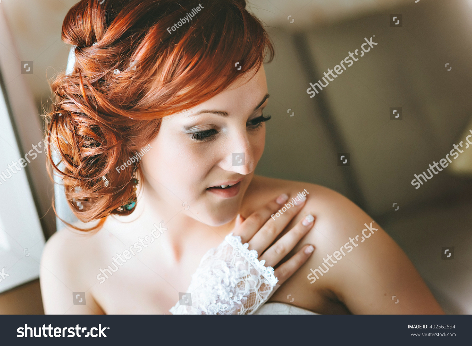 portrait of red-haired young bride, smiling, hand on shoulder. #402562594