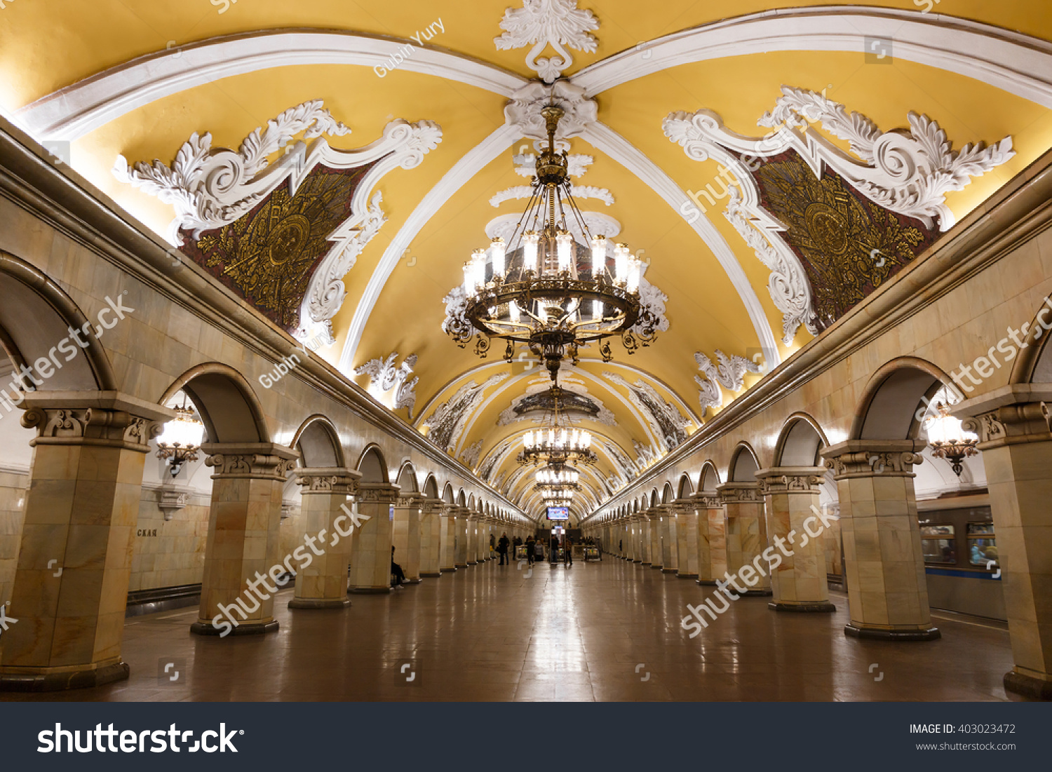 The hall of Komsomolskaya subway (Circle Line) in Moscow. This metro station is an example of one of the most attractive stalinist architecture of the city underground. #403023472