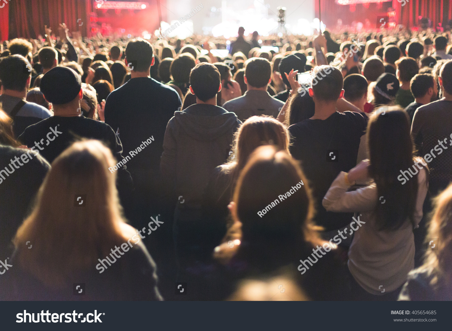 The audience watching the concert on stage. #405654685
