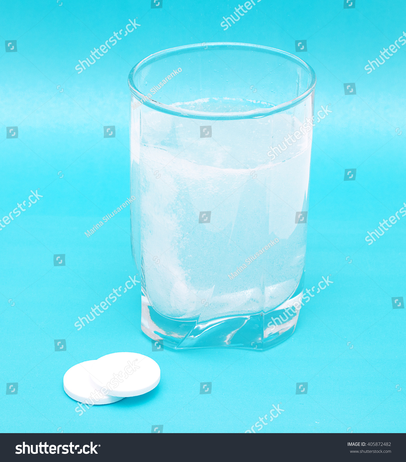 Glass of water and soluble pill #405872482