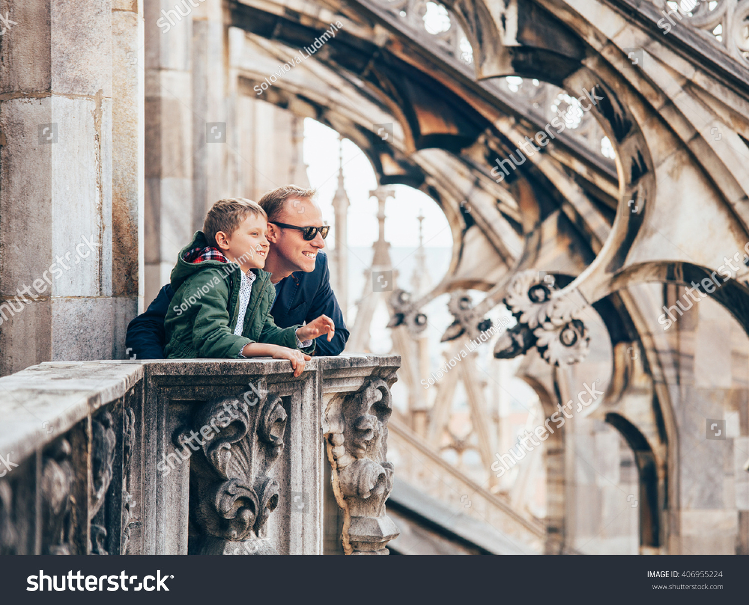 Father with son on the roof of Duomo di Milano #406955224
