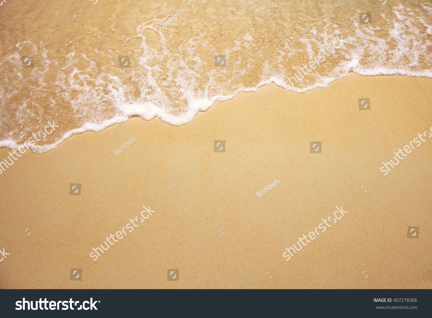 Soft wave of the sea on the sandy beach #407278306