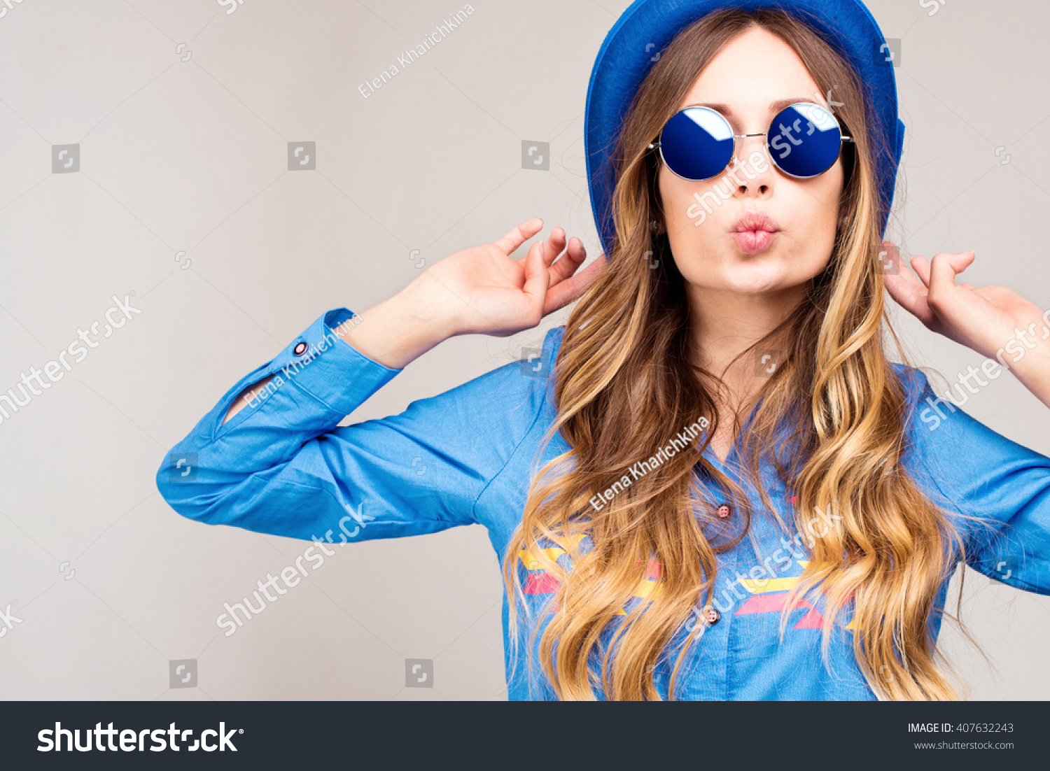 Cool hipster student woman wearing eyewear glasses . Caucasian female university student looking at camera smiling happy. #407632243