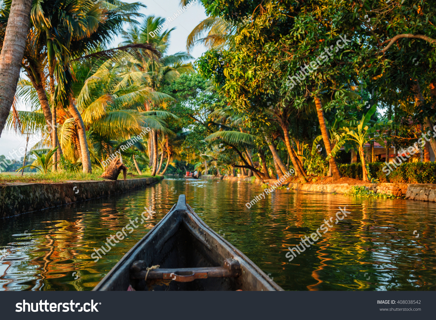 Kerala backwaters tourism travel in canoe boat. Kerala, India #408038542