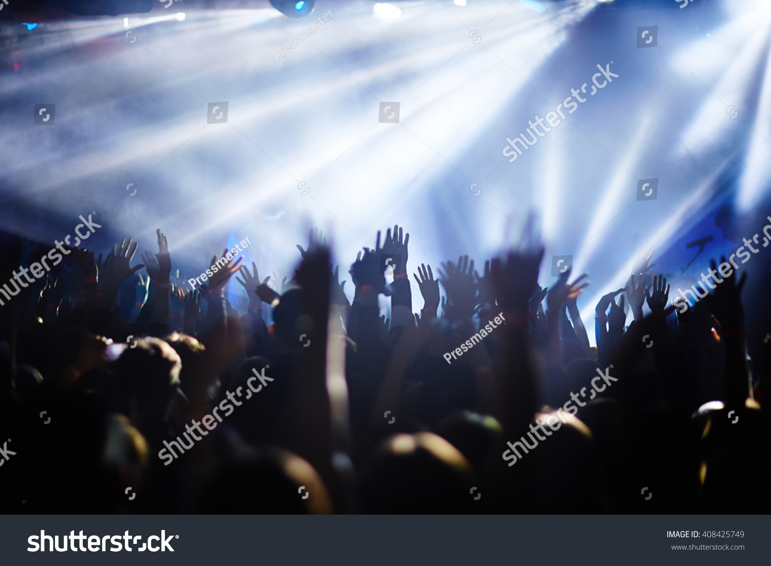 Crowd with raised hands #408425749