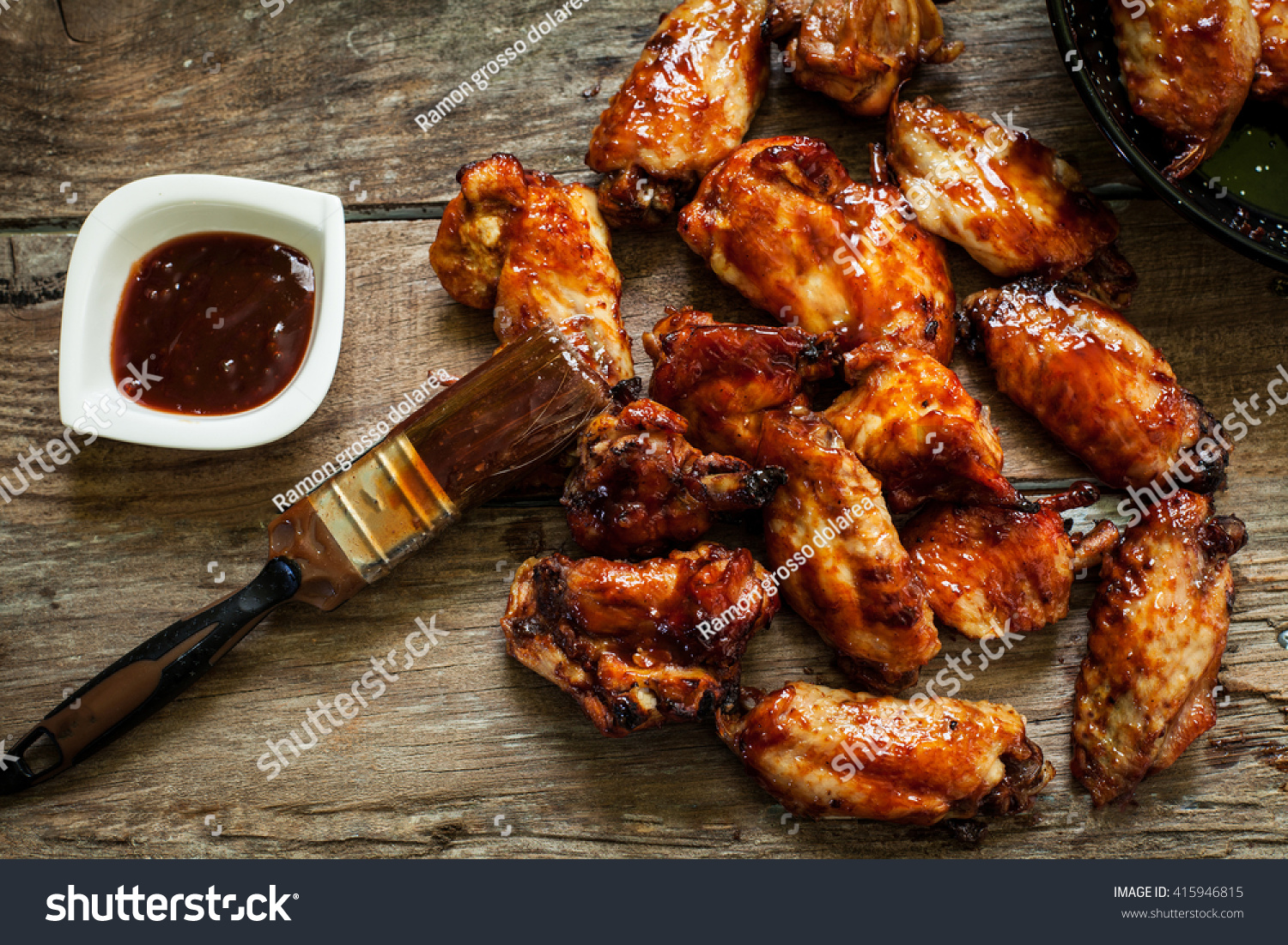 BBQ chicken wings with sauce for dip #415946815