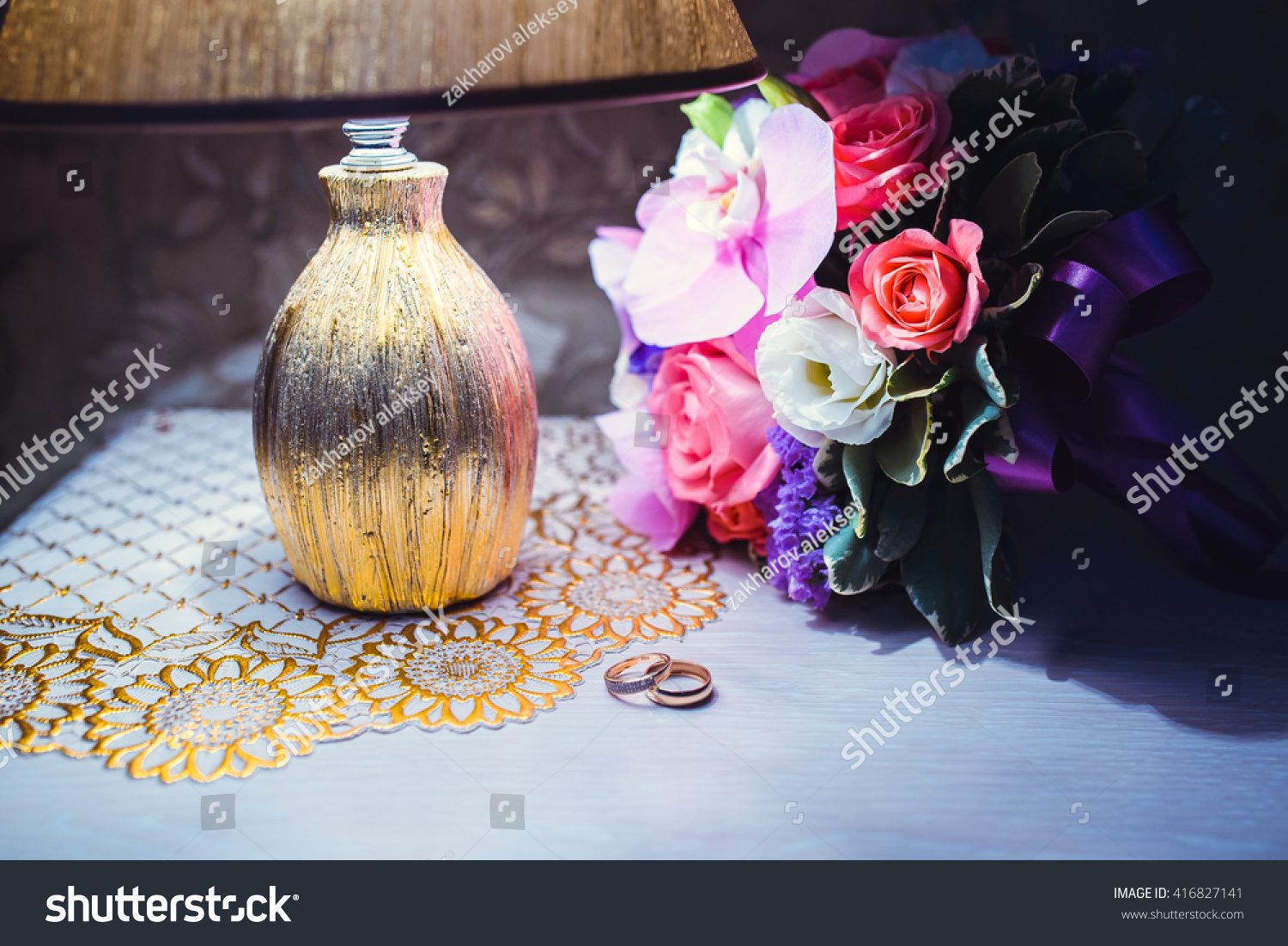 still life with wedding bouquet and rings #416827141