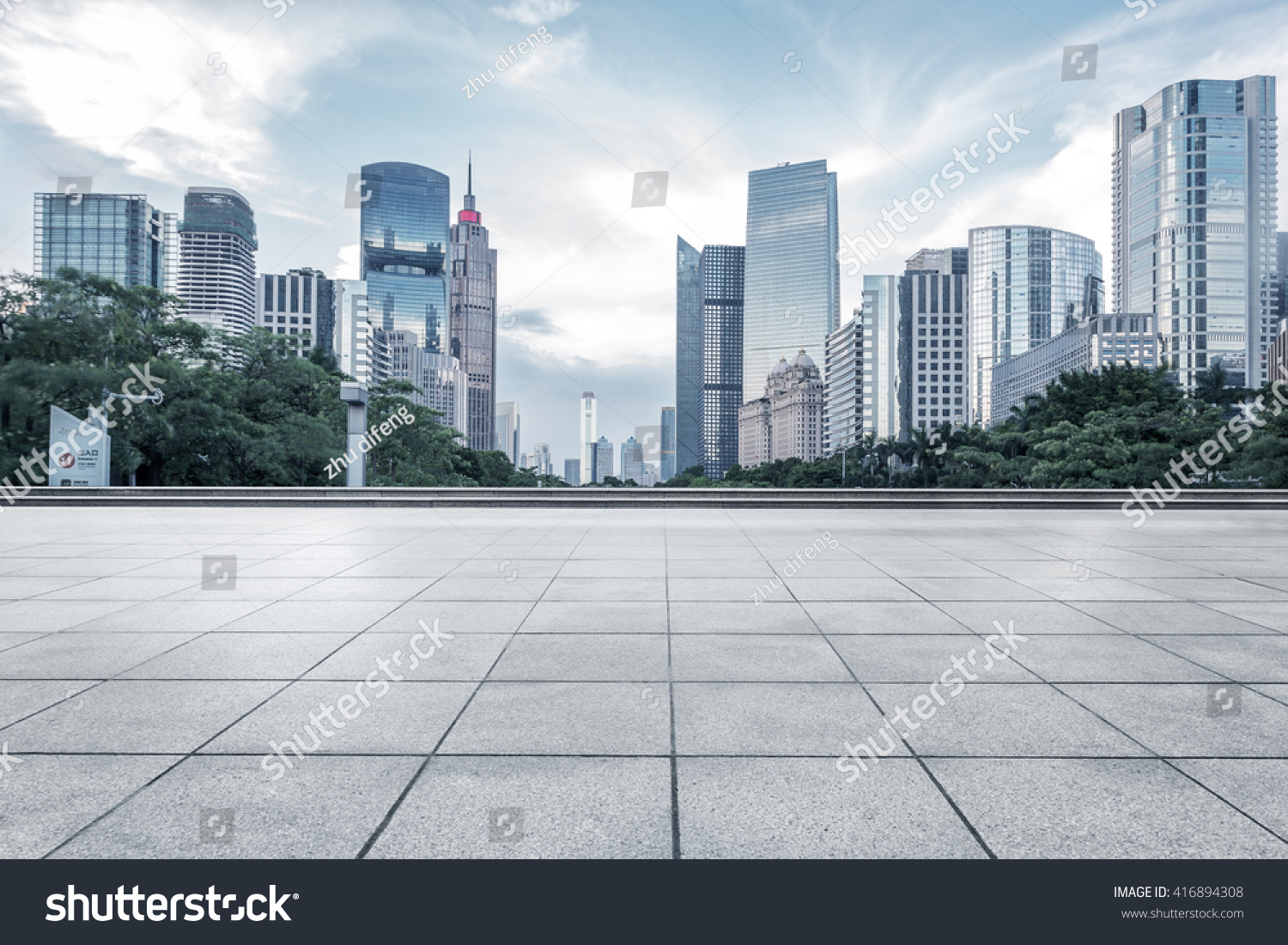 empty marble floor with cityscape and skyline in cloud sky #416894308