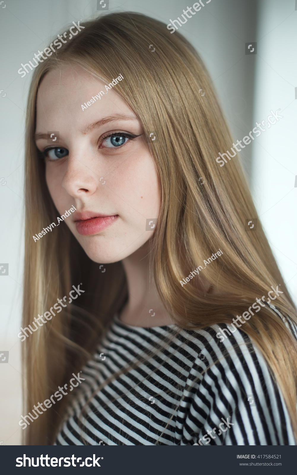 clean portrait of a pretty girl at home #417584521