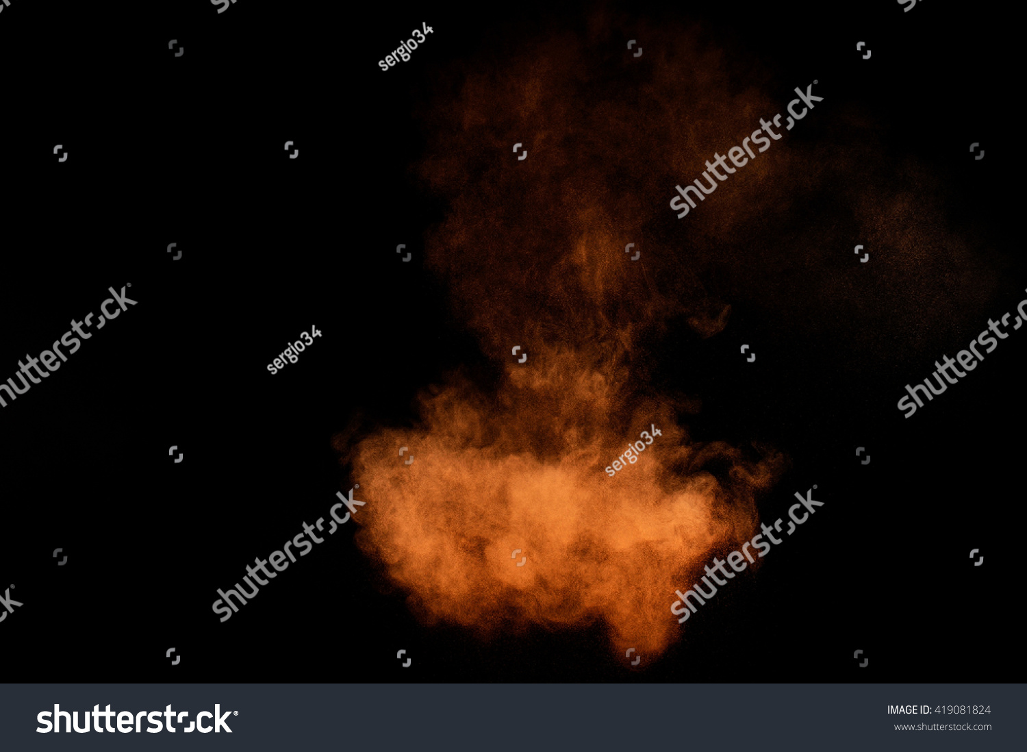 Orange powder explosion on black background. Colored powder cloud. Colorful dust explode. Paint Holi. #419081824