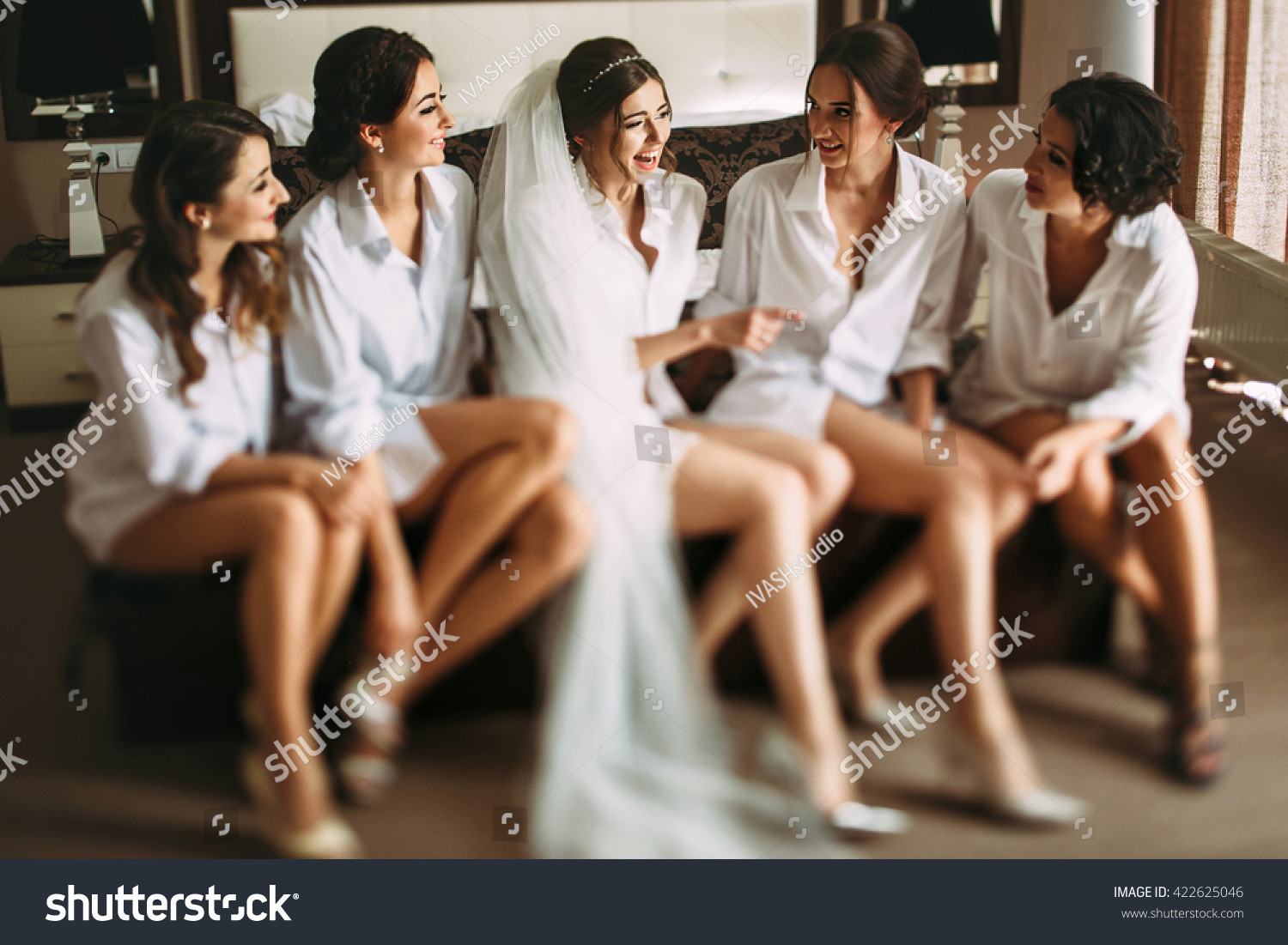 Bride and her friends have a nice conversation #422625046