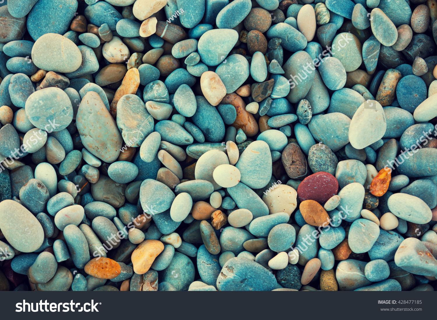 Abstract nature pebbles background. Blue pebbles texture. Stone background.  Blue vintage color. Sea pebble beach. Beautiful nature. Turquoise color #428477185