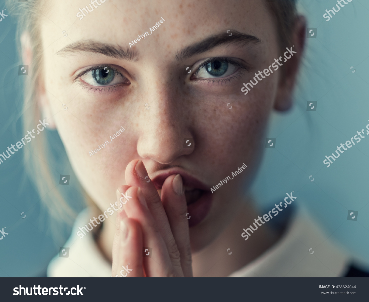 beautiful girl with freckles crying #428624044