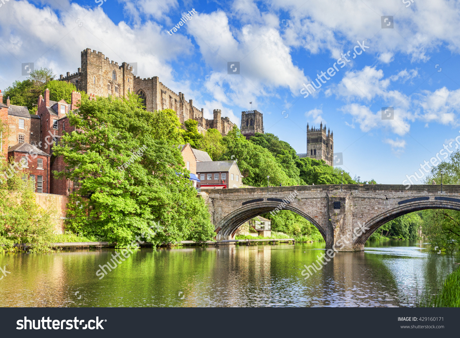 Durham Castle and Cathedral on their rock above the city, and Framwellgate Bridge spanning the River Wear, England, UK #429160171