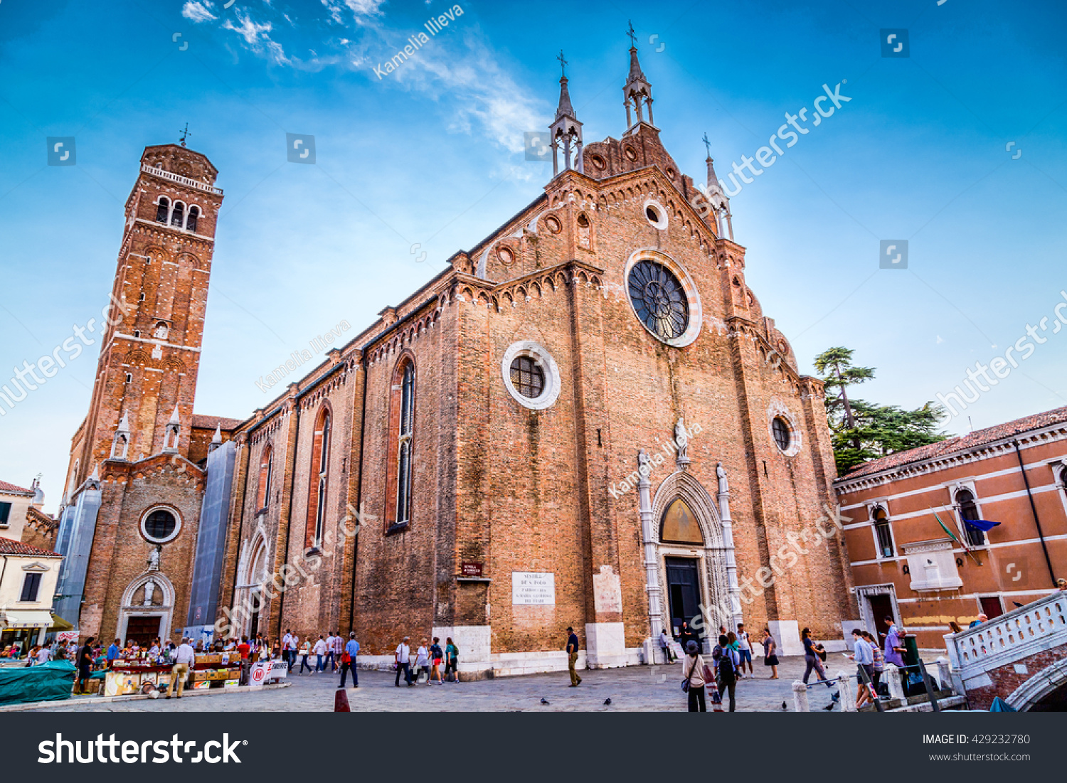 View of Santa Maria Gloriosa dei Frari Church in Venice, Italy (Basilica di Santa Maria Gloriosa dei Frari) on a sunny summer day #429232780