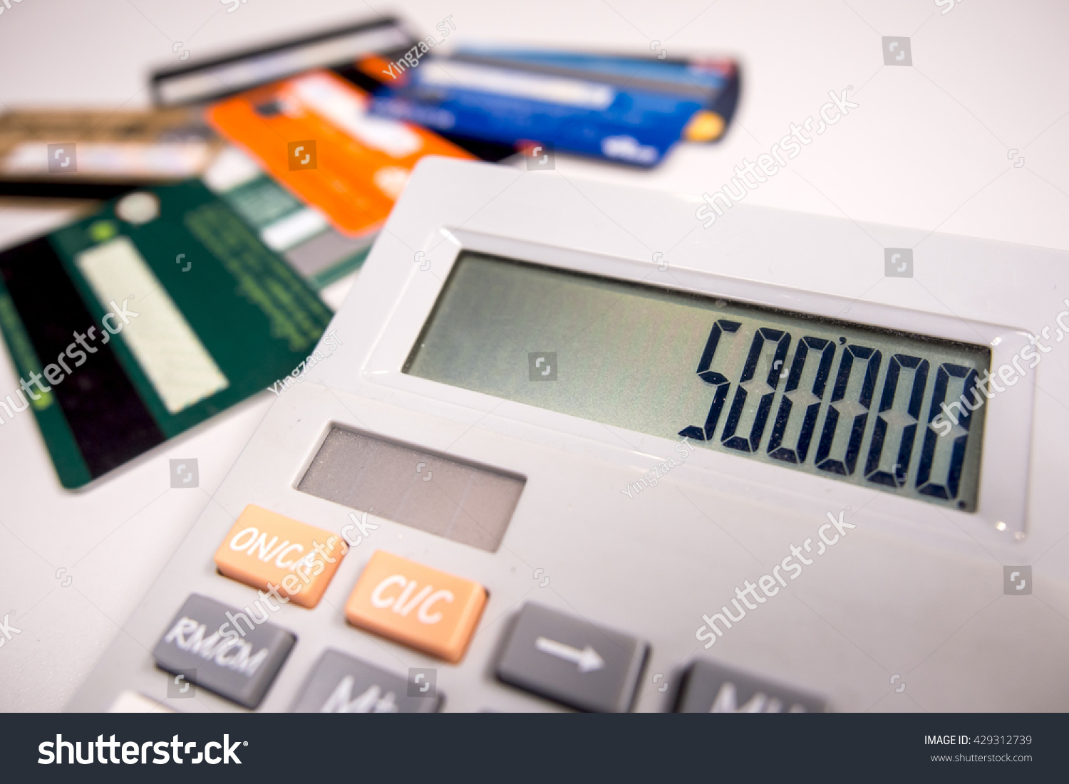 calculating the credit card. #429312739