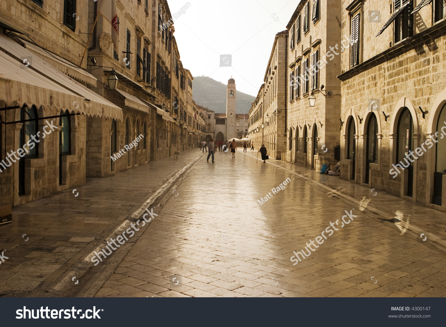 The Stradun (sometimes the Strada) is the main shopping street and gathering area in the city of Dubrovnik in Croatia. The cobblestones have been polished smooth over hundreds of years. #4300147