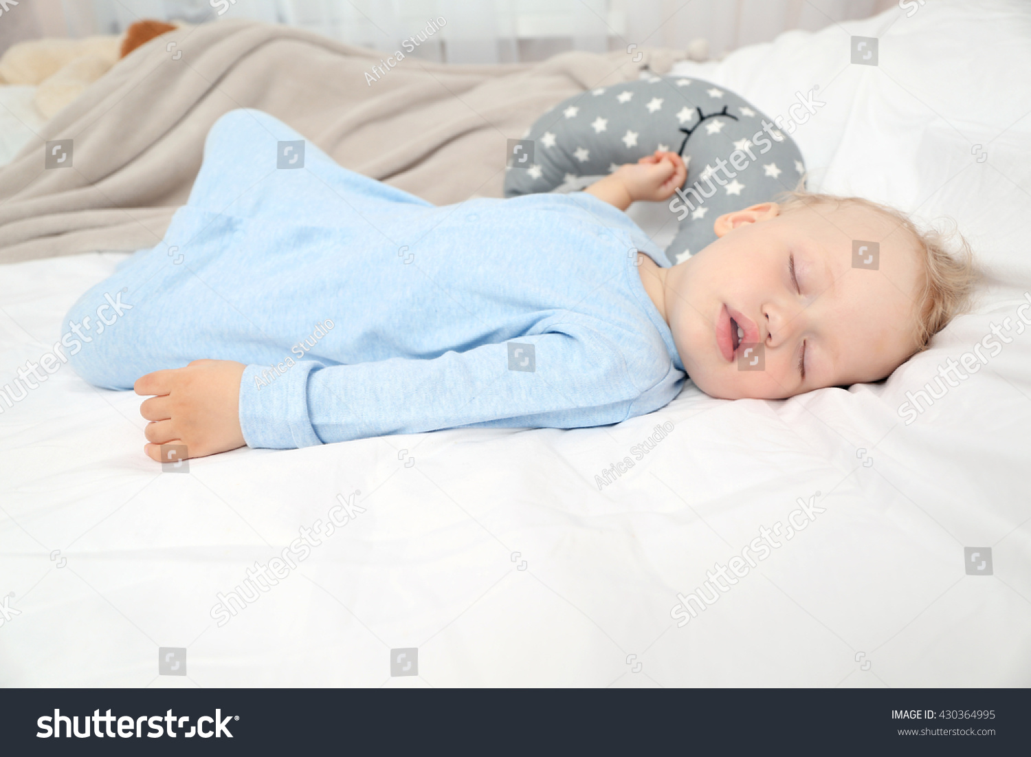 Baby sleeping on bed #430364995