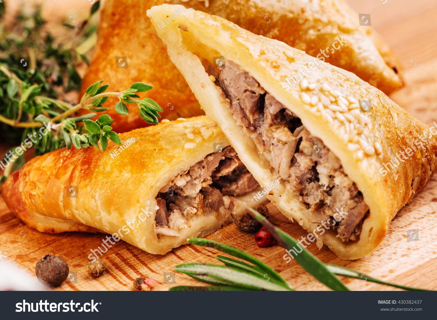 Delicious samosa pies with meat on plate. Menu, restaurant, recipe concept. Served in traditional oriental restaurant. Selected focus. #430382437