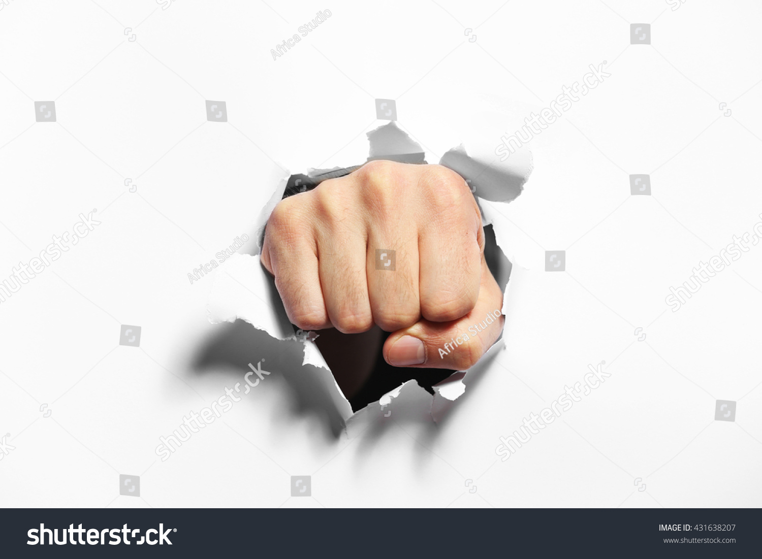 Male fist punching through paper, isolated on white #431638207