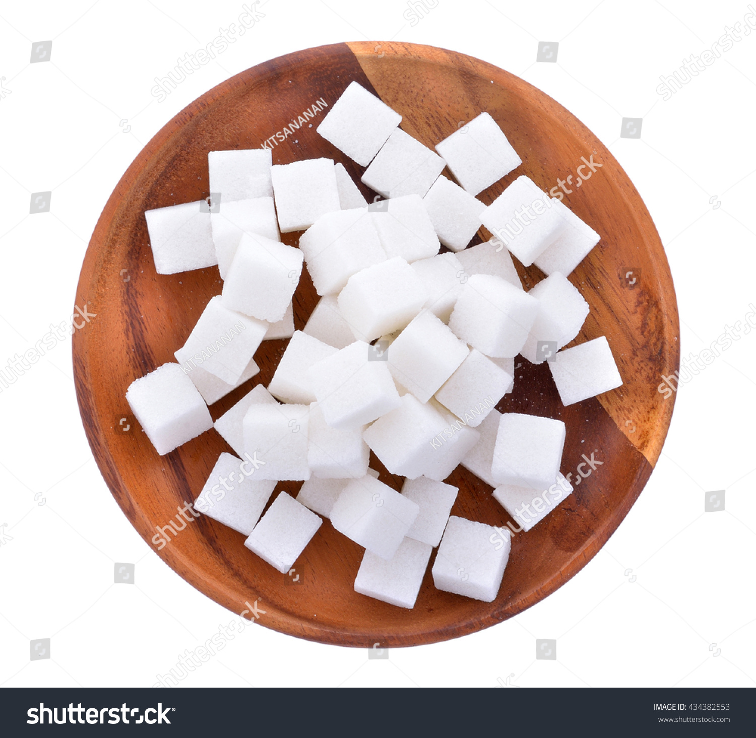 Sugar cube in wood plate #434382553