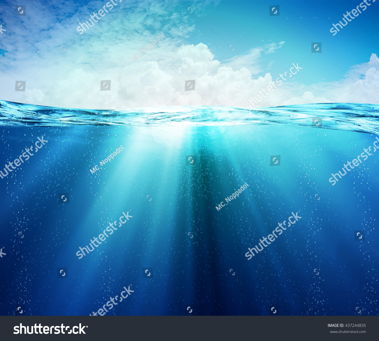Underwater or under the sea Beauty turquoise sea, In view of the sky bright atmosphere with some clouds. #437244835