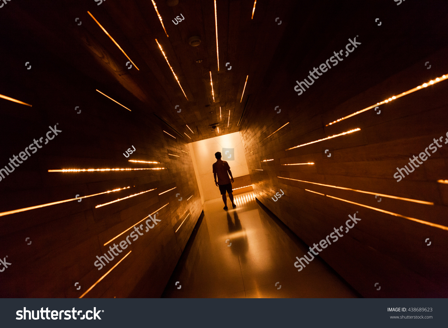 Silhouette human in the center of beautiful corridor design. #438689623