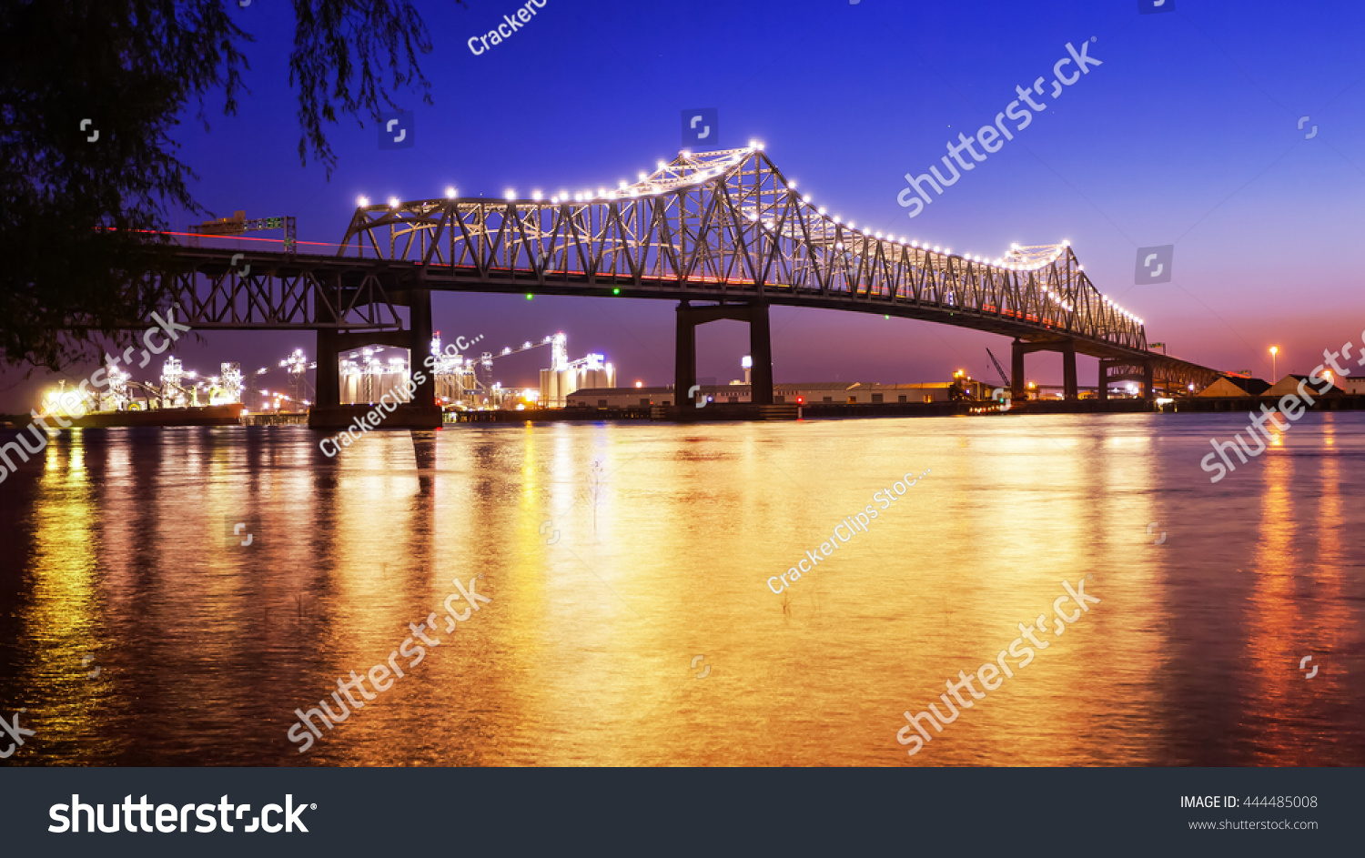 Horace Wilkinson Bridge crosses over the Mississippi River at night in Baton Rouge, Louisiana #444485008