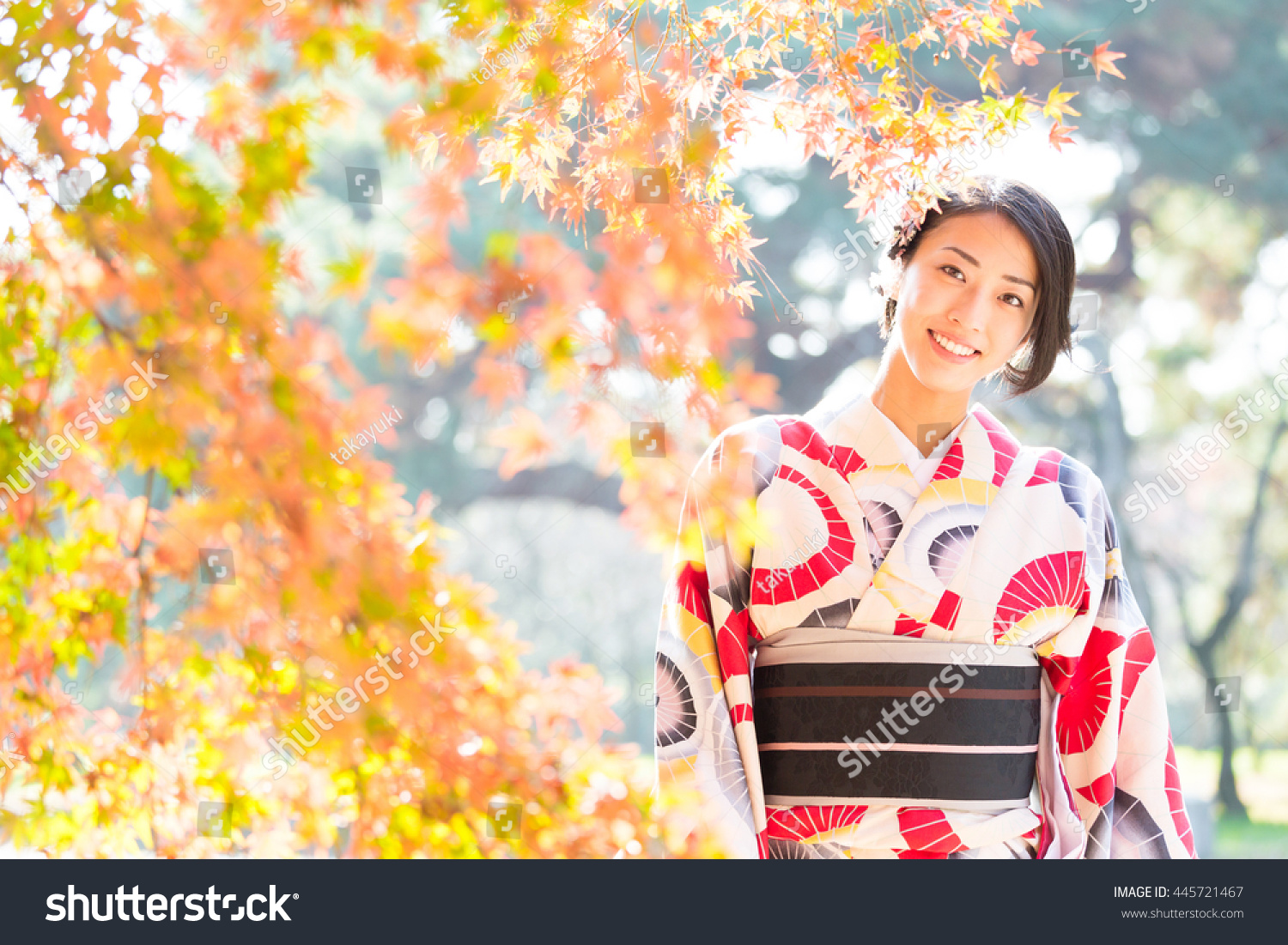 woman wearing japanese traditional kimono in autumn #445721467