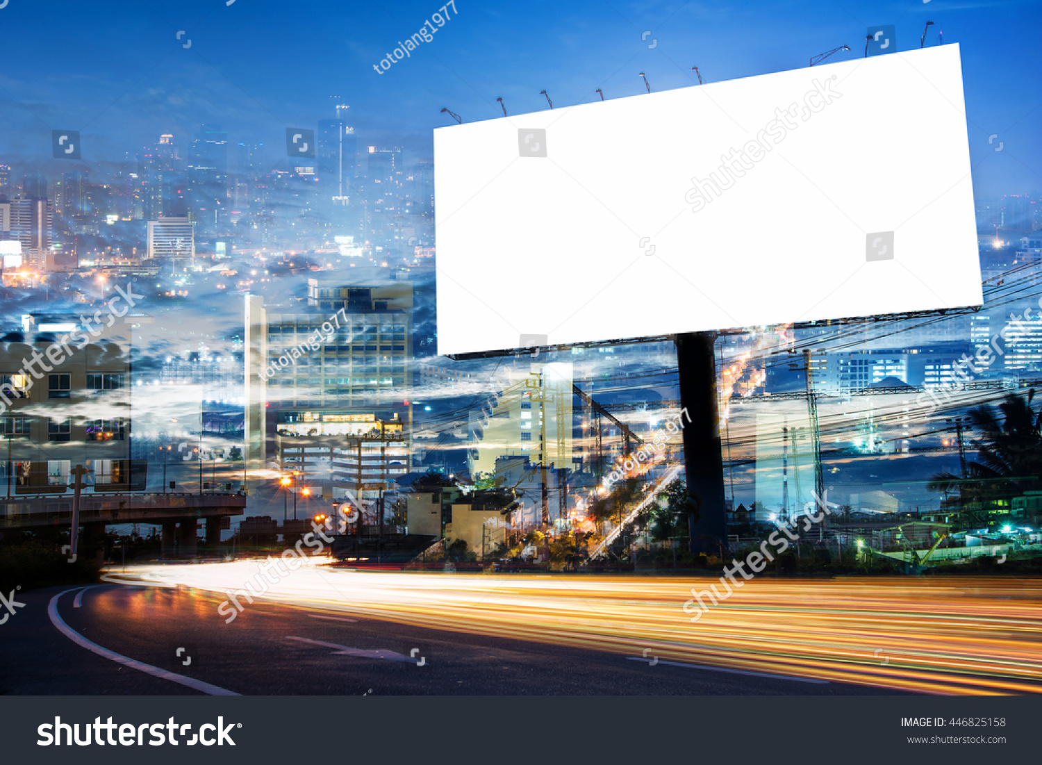 double exposure of blank billboard for advertisement at twilight time with light trails on the road at dusk  #446825158