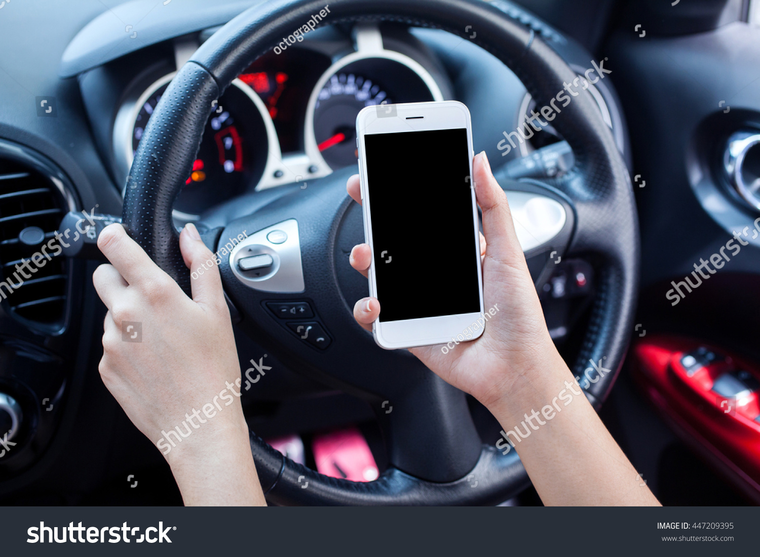 woman driver using smart phone in car, blank screen for text and content
 #447209395