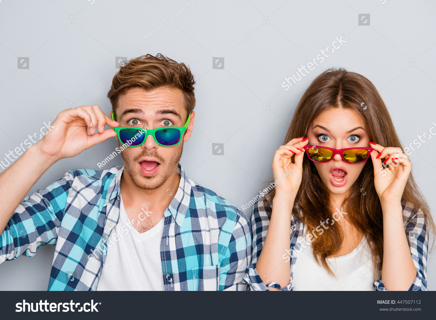 Wow! Surprised man and woman in glasses with open mouth #447507112